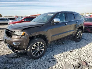 2017 Jeep Grand Cherokee Overland with VIN 1C4RJFCGXHC741590, listed as a Copart auction lot 82160804 with 157,751 mi miles and Salvage Title. Bid and sale history available at carsss.com. Image 1.