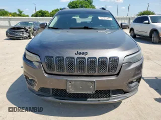 2019 Jeep Cherokee Altitude with VIN 1C4PJLLB8KD448427, listed as a Copart auction lot 58101445 with 173,007 mi miles and Salvage title. Bid and sale history available at DreamBid. Image 5.