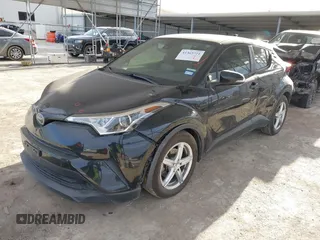 2019 Toyota C-HR XLE with VIN JTNKHMBX4K1032039, listed as a IAAI auction lot 41365721 with 96,194 mi miles. Bid and sale history available at carsss.com. Image 2.