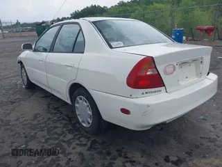 1999 Mitsubishi Mirage z VIN JA3AY36C2XU019134, wystawiony jako IAAI lot #42077649 z przebiegiem 304 426 mil mil oraz . Historia ofert i sprzedaży dostępna na DreamBid. Obrazek 3.