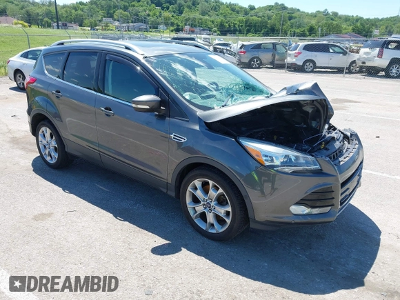 2015 Ford Escape Titanium z VIN 1FMCU9J92FUB01007, wystawiony jako IAAI lot #42319246 z przebiegiem 90 782 mil mil oraz . Historia ofert i sprzedaży dostępna na DreamBid. Obrazek 1.