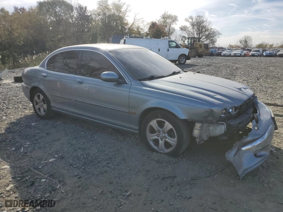 2002 Jaguar X-Type with VIN SAJEA51C62WC50078, listed as a Copart auction lot 78474784 with 144,780 mi miles and Salvage Title. Bid and sale history available at carsss.com. Image 4.