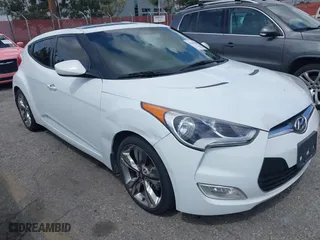 2015 Hyundai Veloster with VIN KMHTC6AD5FU231224, listed as a IAAI auction lot 41944186 with 103,124 mi miles. Bid and sale history available at carsss.com. Image 6.