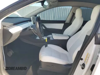 2022 Tesla Model Y Long Range with VIN 7SAYGDEE1NF339663, listed as a Copart auction lot 49771965 with 33,734 mi miles and Salvage Title. Bid and sale history available at carsss.com. Image 7.