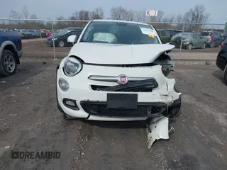 2016 FIAT 500X Lounge z VIN ZFBCFYDT0GP328541, wystawiony jako IAAI lot #42016388 z przebiegiem 134 806 mil mil oraz . Historia ofert i sprzedaży dostępna na DreamBid. Obrazek 12.