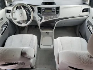 2012 Toyota Sienna with VIN 5TDKA3DC0CS014719, listed as a Copart auction lot 88358865 with 118,901 mi miles and Salvage Title. Bid and sale history available at DreamBid. Image 8.