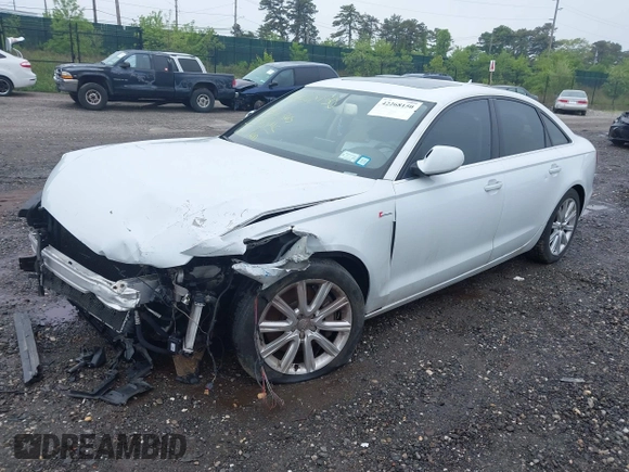 2014 Audi A6 Premium Plus z VIN WAUFGAFC4EN081900, wystawiony jako IAAI lot #42268150 z przebiegiem 150 238 mil mil oraz . Historia ofert i sprzedaży dostępna na DreamBid. Obrazek 2.