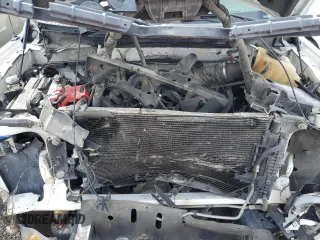 2011 Ford F-150 XL with VIN 1FTNF1CF7BKD62697, listed as a Copart auction lot 51633435 with 148,715 mi miles and Salvage Title. Bid and sale history available at carsss.com. Image 11.
