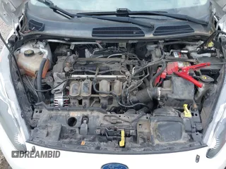 2014 Ford Fiesta S z VIN 3FADP4AJ6EM168697, wystawiony jako IAAI lot #42438281 z przebiegiem 78 298 mil mil oraz . Historia ofert i sprzedaży dostępna na DreamBid. Obrazek 10.