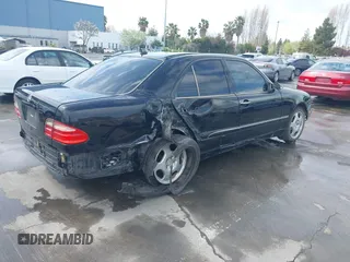 2000 Mercedes-Benz E-Class with VIN WDBJF65JXYA997410, listed as a IAAI auction lot 41939485 with 158,559 mi miles. Bid and sale history available at carsss.com. Image 18.