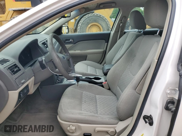 2010 Ford Fusion SE z VIN 3FAHP0HA0AR335424, wystawiony jako Copart lot #58853845 z przebiegiem 168 793 mil mil oraz Szkoda całkowita • Salvage title. Historia ofert i sprzedaży dostępna na DreamBid. Obrazek 7.