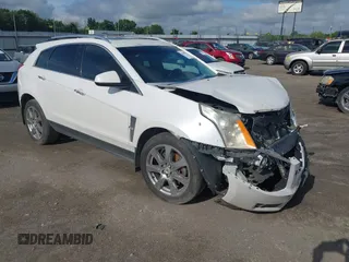 2012 Cadillac SRX Performance Collection with VIN 3GYFNBE34CS659748, listed as a IAAI auction lot 42693814 with 216,854 mi miles and . Bid and sale history available at DreamBid. Image 1.