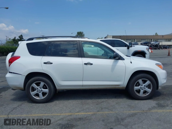 2007 Toyota RAV4 with VIN JTMZK33V875013053, listed as a IAAI auction lot 42133759 with 142,572 mi miles. Bid and sale history available at carsss.com. Image 13.