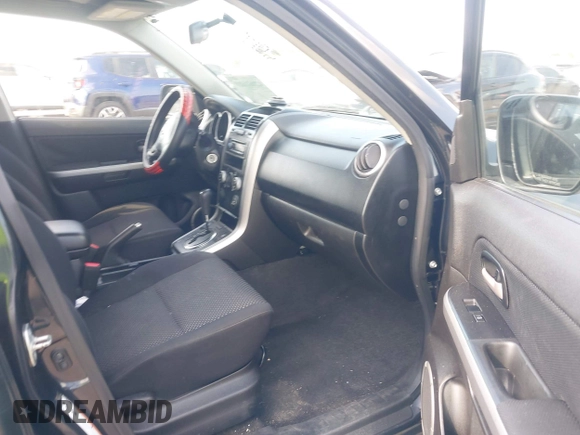 2008 Suzuki Grand Vitara with VIN JS3TE941284102380, listed as a IAAI auction lot 42061609 with 103,554 mi miles and . Bid and sale history available at DreamBid. Image 5.