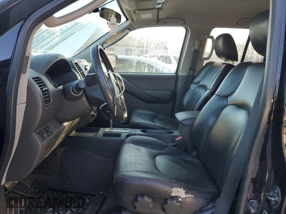 2010 Nissan Frontier LE with VIN 1N6AD0EV1AC407478, listed as a Copart auction lot 82302504 with 146,560 mi miles and Salvage title. Bid and sale history available at DreamBid. Image 7.