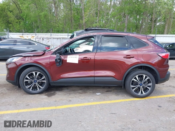 2021 Ford Escape SE Hybrid with VIN 1FMCU9BZ9MUA15592, listed as a IAAI auction lot 42261312 with 56,525 mi miles and . Bid and sale history available at DreamBid. Image 14.