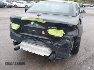 2015 BMW 4 Series 435i with VIN WBA3T3C57FP738517, listed as a IAAI auction lot 41975696 with 61,140 mi miles and . Bid and sale history available at carsss.com. Image 6.