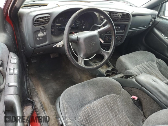 1999 Chevrolet Blazer LS с VIN 1GNCT18W3XK150385, выставлен на аукционе Copart как лот 58490985 с пробегом 262 007 миль миль и Списание • Salvage title. История ставок и продаж доступна на DreamBid. Изображение 8.