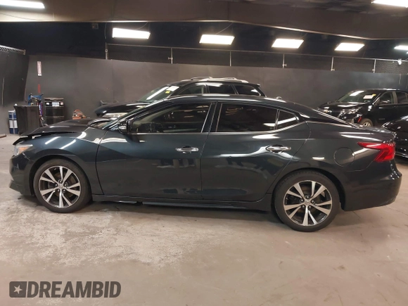 2017 Nissan Maxima S with VIN 1N4AA6APXHC362966, listed as a IAAI auction lot 42399271 with 152,016 mi miles and . Bid and sale history available at DreamBid. Image 14.