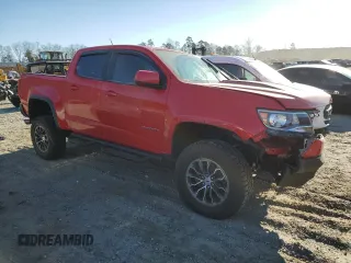 2018 Chevrolet Colorado 4WD ZR2 with VIN 1GCGTEEN6J1104009, listed as a Copart auction lot 47365595 with 48,997 mi miles and Salvage Title. Bid and sale history available at carsss.com. Image 4.
