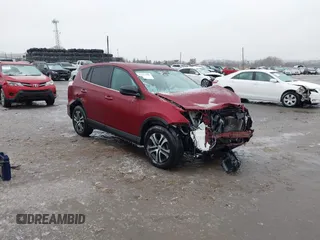 2018 Toyota RAV4 LE with VIN 2T3BFREV5JW805408, listed as a IAAI auction lot 41513008 with 56,304 mi miles and . Bid and sale history available at DreamBid. Image 1.