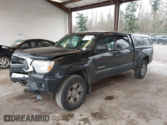 2015 Toyota Tacoma with VIN 3TMMU4FN1FM086408, listed as a IAAI auction lot 41320197 with 161,356 mi miles and . Bid and sale history available at DreamBid. Image 2.
