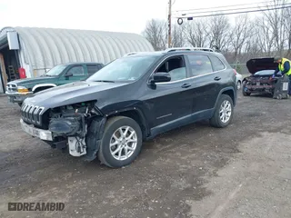 2014 Jeep Cherokee Latitude with VIN 1C4PJMCS0EW264288, listed as a IAAI auction lot 41921730 with 137,586 mi miles. Bid and sale history available at carsss.com. Image 17.