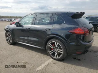 2013 Porsche Cayenne GTS с VIN WP1AD2A29DLA72323, выставлен на аукционе Copart как лот 52990885 с пробегом 100 812 миль миль и Списание • Salvage title. История ставок и продаж доступна на DreamBid. Изображение 2.