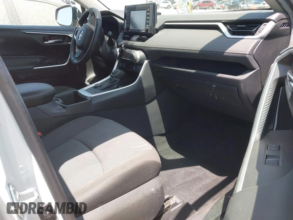 2022 Toyota RAV4 Hybrid XLE with VIN 2T3RWRFV9NW130472, listed as a IAAI auction lot 40990707 with 156,174 mi miles and . Bid and sale history available at DreamBid. Image 5.