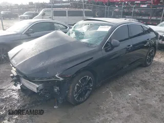 2022 Kia K5 GT-Line z VIN 5XXG64J28NG088578, wystawiony jako IAAI lot #41933138 z przebiegiem 71 071 mil mil oraz . Historia ofert i sprzedaży dostępna na DreamBid. Obrazek 2.