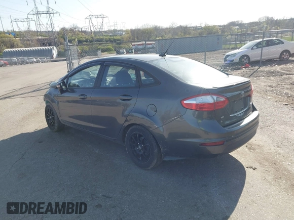 2015 Ford Fiesta SE with VIN 3FADP4BJ1FM128656, listed as a IAAI auction lot 41987997 with 106,588 mi miles. Bid and sale history available at carsss.com. Image 3.