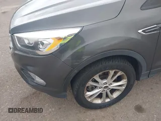 2017 Ford Escape SE with VIN 1FMCU9GD1HUB46034, listed as a IAAI auction lot 41840906 with 143,806 mi miles. Bid and sale history available at carsss.com. Image 6.