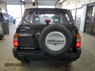 2002 Chevrolet Tracker with VIN 2CNBJ18CX26906088, listed as a Copart auction lot 79519944 with 111,342 mi miles and Salvage title. Bid and sale history available at DreamBid. Image 6.
