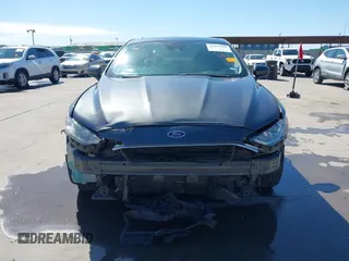 2020 Ford Fusion SE with VIN 3FA6P0HD3LR136288, listed as a IAAI auction lot 41699942 with 99,409 mi miles. Bid and sale history available at carsss.com. Image 6.