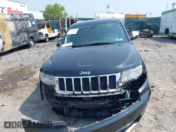 2011 Jeep Grand Cherokee Overland with VIN 1J4RR6GT3BC574037, listed as a IAAI auction lot 42411532 with 158,765 mi miles and . Bid and sale history available at DreamBid. Image 13.
