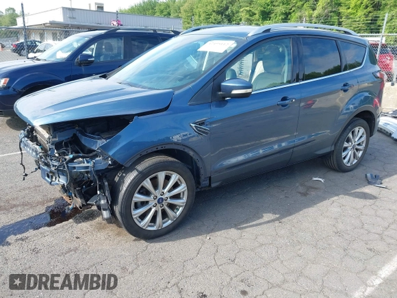 2018 Ford Escape Titanium with VIN 1FMCU9J92JUB01162, listed as a IAAI auction lot 42495112 with 96,280 mi miles and . Bid and sale history available at DreamBid. Image 2.