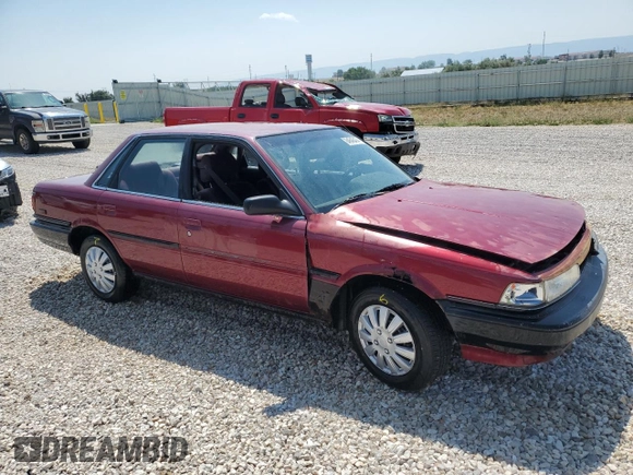1991 Toyota Camry DLX z VIN 4T1SV21E4MU332100, wystawiony jako Copart lot #64645474 z przebiegiem 164 143 mil mil oraz Czysty tytuł • Clean title. Historia ofert i sprzedaży dostępna na DreamBid. Obrazek 4.