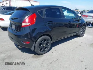 2011 Ford Fiesta SES with VIN 3FADP4FJ9BM181965, listed as a IAAI auction lot 42092140 with 150,304 mi miles. Bid and sale history available at carsss.com. Image 4.
