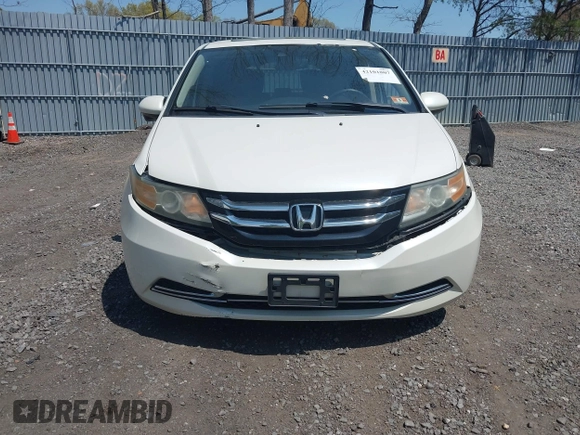 2015 Honda Odyssey EX-L with VIN 5FNRL5H64FB069742, listed as a IAAI auction lot 42101807 with 152,611 mi miles and . Bid and sale history available at DreamBid. Image 12.