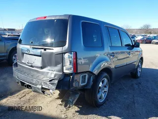 2015 Honda Pilot EX-L with VIN 5FNYF4H57FB063115, listed as a IAAI auction lot 41248234 with 187,752 mi miles and . Bid and sale history available at carsss.com. Image 4.