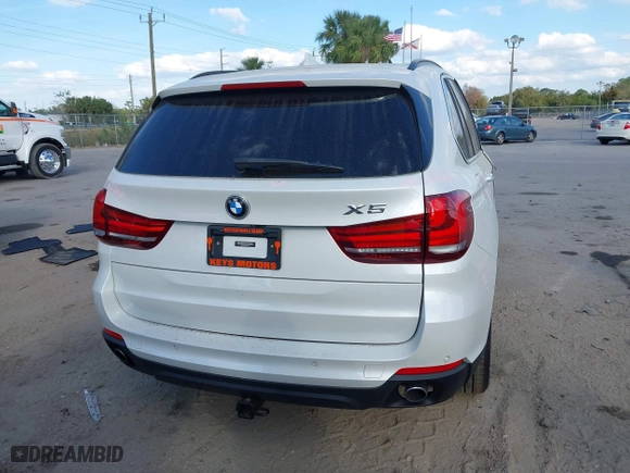 2016 BMW X5 xDrive35i with VIN 5UXKR0C54G0P27141, listed as a IAAI auction lot 41553602 with 61,947 mi miles. Bid and sale history available at carsss.com. Image 17.