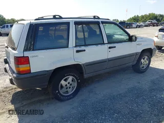 1994 Jeep Grand Cherokee Laredo with VIN 1J4GZ58S6RC295621, listed as a IAAI auction lot 42751869 with 370,230 mi miles and . Bid and sale history available at DreamBid. Image 4.