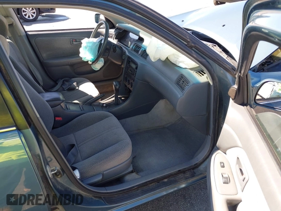2001 Toyota Camry CE with VIN 4T1BG22K41U782923, listed as a IAAI auction lot 41773916 with 201,038 mi miles and . Bid and sale history available at carsss.com. Image 5.