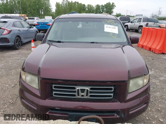 2007 Honda Ridgeline RTL z VIN 2HJYK16507H523994, wystawiony jako IAAI lot #42467682 z przebiegiem 283 292 mil mil oraz . Historia ofert i sprzedaży dostępna na DreamBid. Obrazek 6.