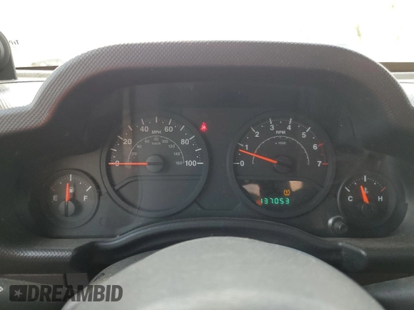 2009 Jeep Wrangler X with VIN 1J4FA241X9L765664, listed as a Copart auction lot 51802065 with 137,053 mi miles and Salvage Title. Bid and sale history available at DreamBid. Image 9.