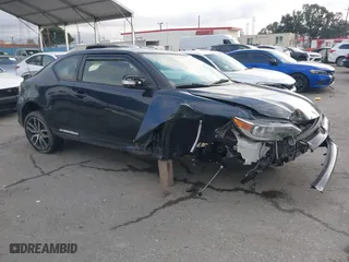 2015 Scion tC with VIN JTKJF5C76F3094314, listed as a IAAI auction lot 41557740 with 100,863 mi miles. Bid and sale history available at carsss.com. Image 1.