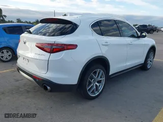 2018 Alfa Romeo Stelvio with VIN ZASFAKANXJ7B73800, listed as a IAAI auction lot 41028864 with 102,518 mi miles. Bid and sale history available at carsss.com. Image 4.