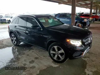 2019 Mercedes-Benz GLC 300 with VIN WDC0G4JB2KF587198, listed as a Copart auction lot 60434795 with 74,546 mi miles and Salvage title. Bid and sale history available at DreamBid. Image 4.