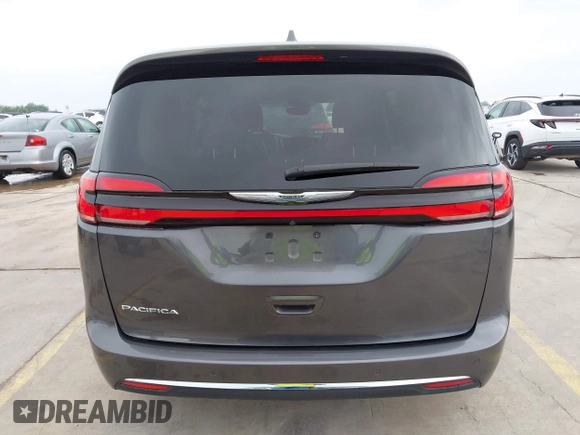 2021 Chrysler Pacifica Touring L z VIN 2C4RC1BG3MR574439, wystawiony jako IAAI lot #42190695 z przebiegiem 104 188 mil mil oraz . Historia ofert i sprzedaży dostępna na DreamBid. Obrazek 16.