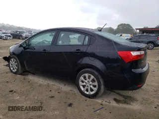 2015 Kia Rio LX with VIN KNADM4A36F6461146, listed as a Copart auction lot 54969204 with 74,501 mi miles and Salvage Title. Bid and sale history available at carsss.com. Image 2.